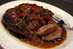 slow cooker beef roast with tomatoes and gravy Recipe