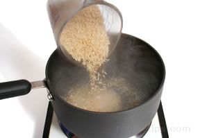 Cooking Rice With The Absorption Method How To Cooking Tips Recipetips Com
